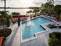 Beautiful pool by the lagoon with a cascade waterfall.