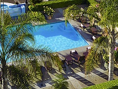 Stylish pool overlooking a tranquil lagoon.