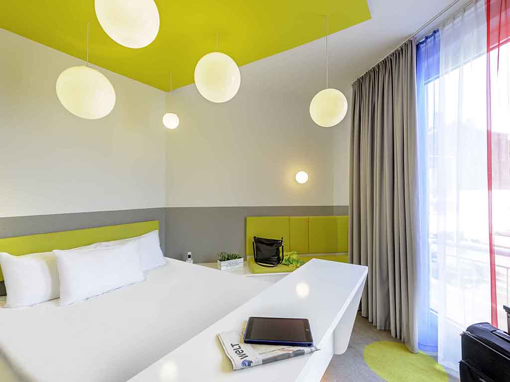 Hotel in aachen ibis styles hotel aachen city Ingerichte kamers kleur paars