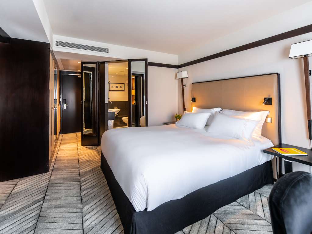 SUITE JUNIOR, 1 Lit King et salon avec canapé-lit — photo 2