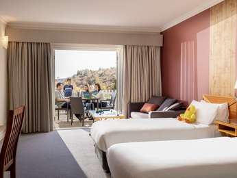 Family Suite with 1 King bed and 2 Single Beds