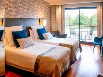 Superior grounds-view room with two twin beds and terrace