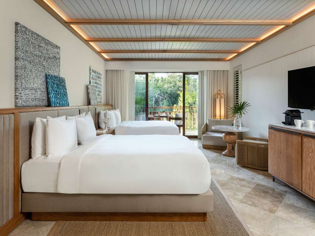 BEACH AREA CASITA 2 Queen - 46 m², avec vue sur le lagon ou le jardin, service Balam Butler. — photo 2