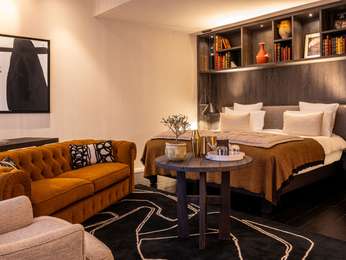 Presidential Suite with balcony and pool view