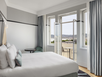 Superior room with a balcony on the upper floor with a sea glimpse