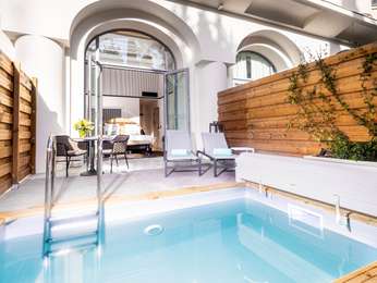 Double Junior Suite on the ground floor with a terrace and private pool