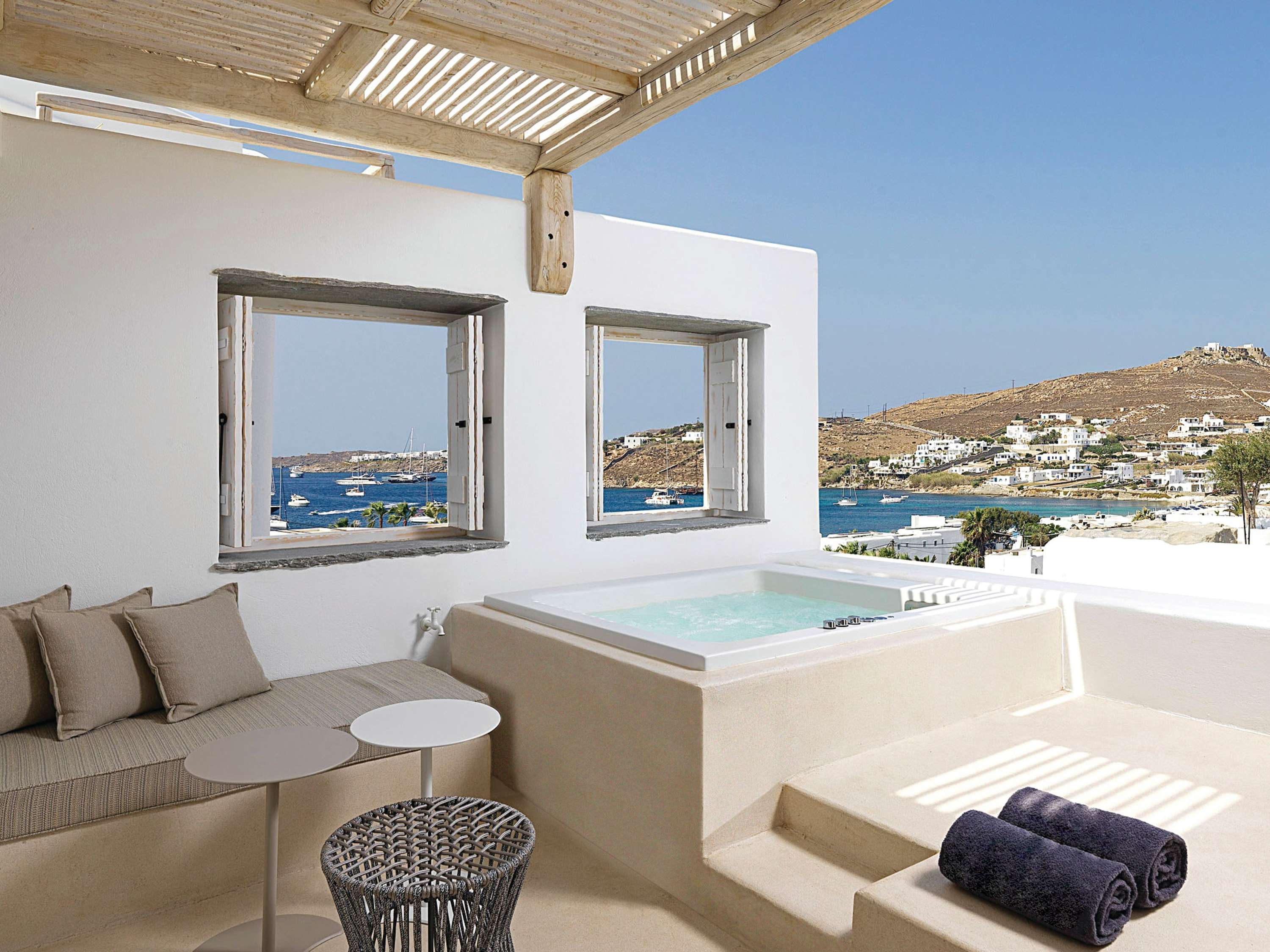 Chambre Deluxe avec vue latérale sur la mer et jacuzzi extérieur — photo 2